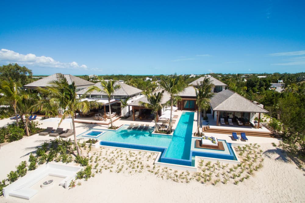 Hawksbill villa aerial view with infinity pools and beach, Providenciales, Turks and Caicos Islands