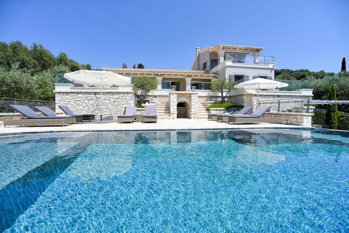 Villa Pearl luxury villa exterior with infinity pool overlooking the Ionian Sea, Kassiopi, Greece